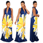 Woman wearing a blue dress with yellow floral pattern in three different views.
