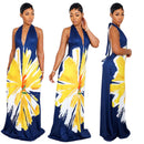 Woman wearing a blue dress with yellow floral pattern in three different views.