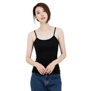 Woman wearing a black tank top against a white background